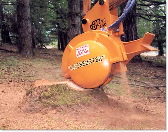 Backhoe stumpgrinder in action