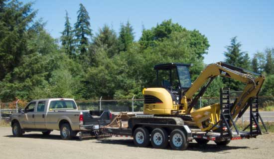 loaded onto trailer for hauling with truck